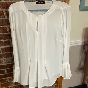 Ivanka Trump long sleeve, white blouse.